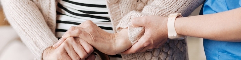 nurse-helping-senior-lady-resized